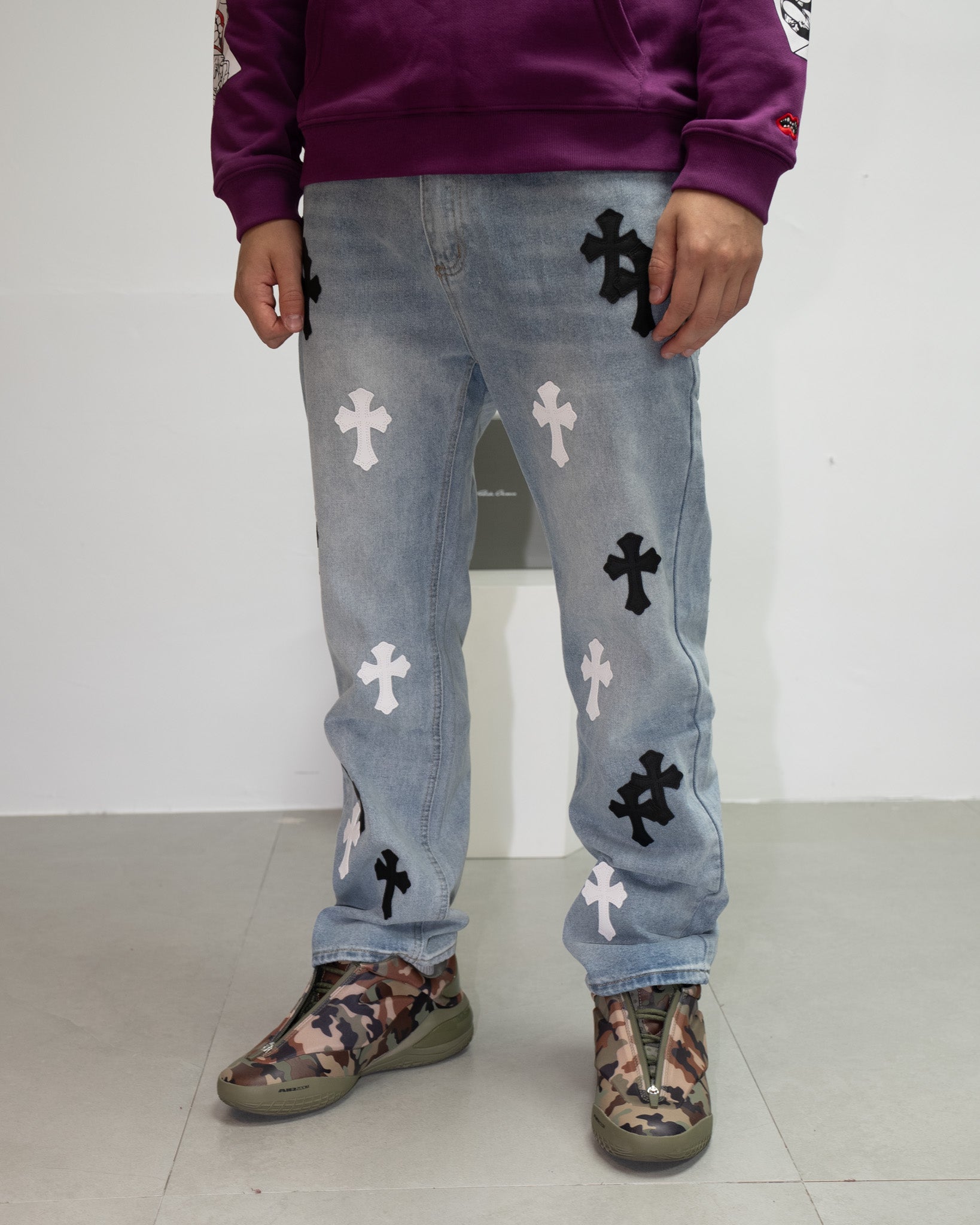 White & Black Cross Patch Light Denim Jeans™