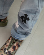 White & Black Cross Patch Light Denim Jeans™