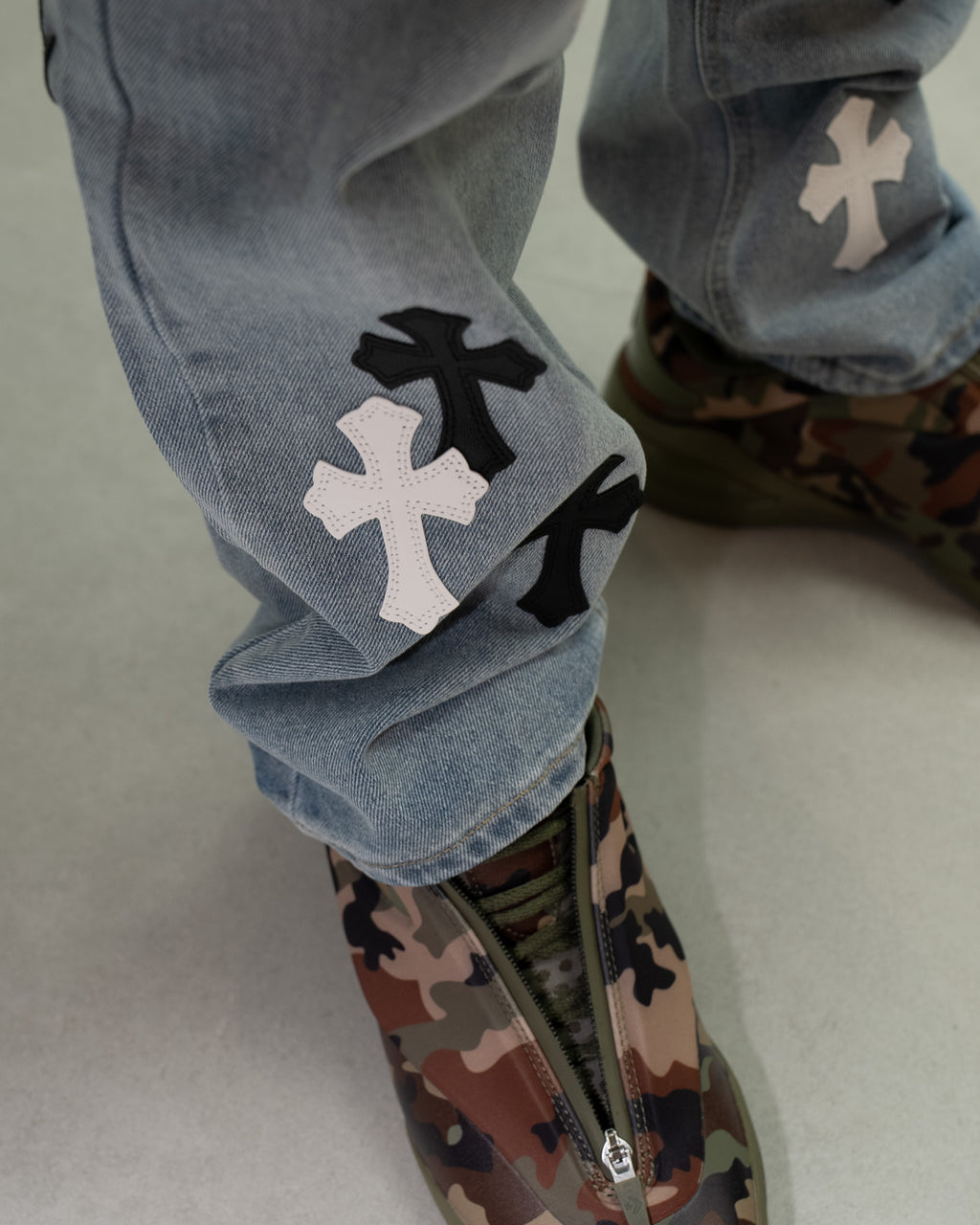 White & Black Cross Patch Light Denim Jeans™