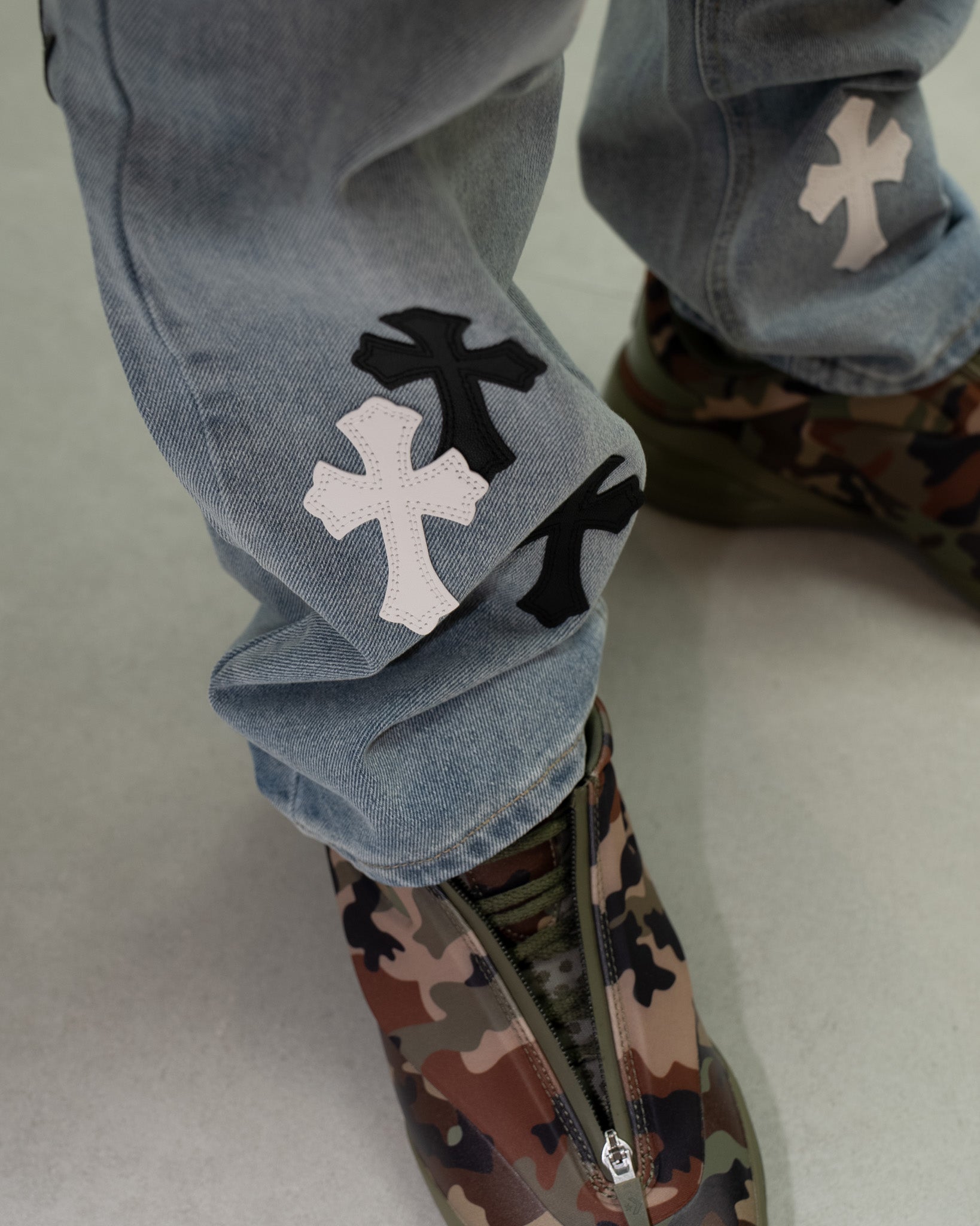 White & Black Cross Patch Light Denim Jeans™