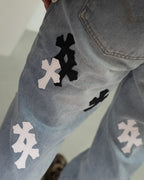 White & Black Cross Patch Light Denim Jeans™