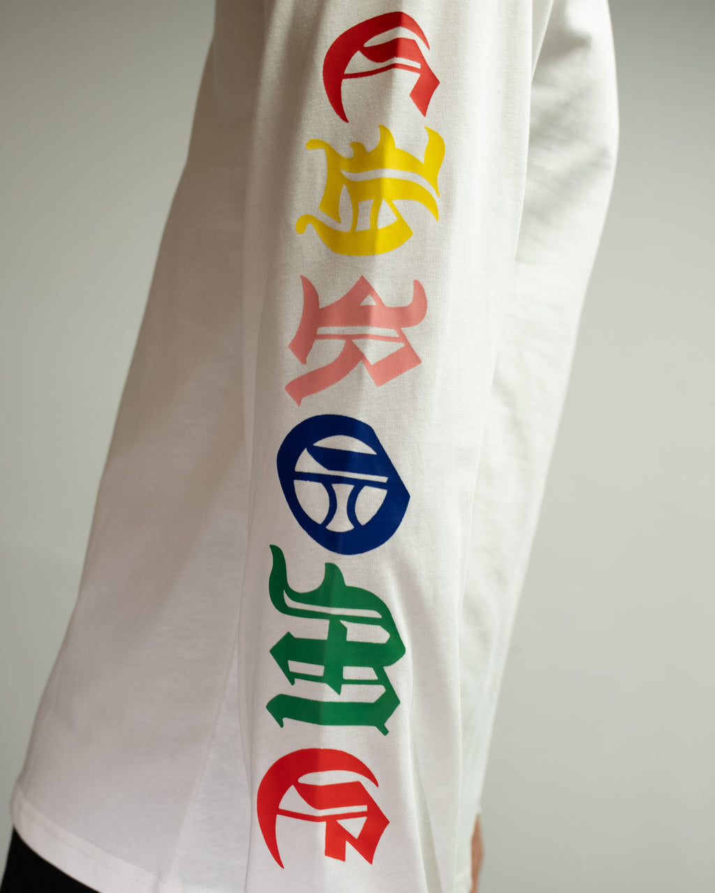 Stacked Multicolor Crosses White Long Sleeve™