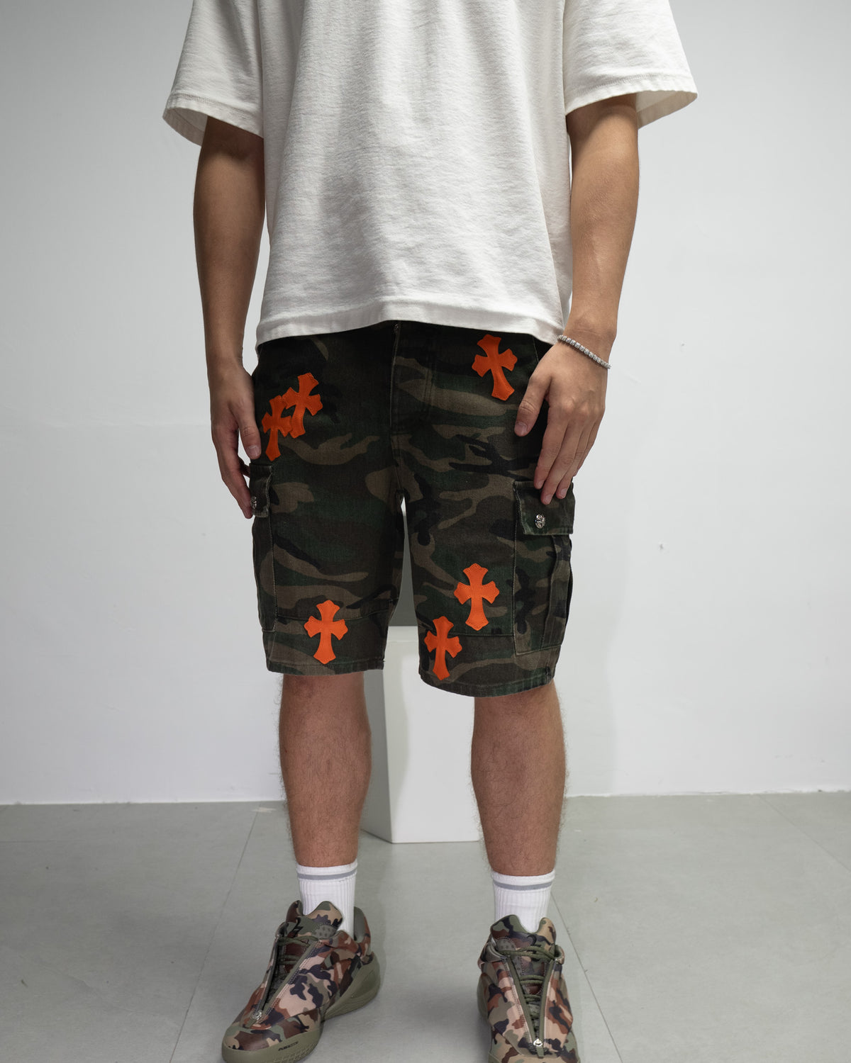 Orange Cross Patch Camo Shorts™
