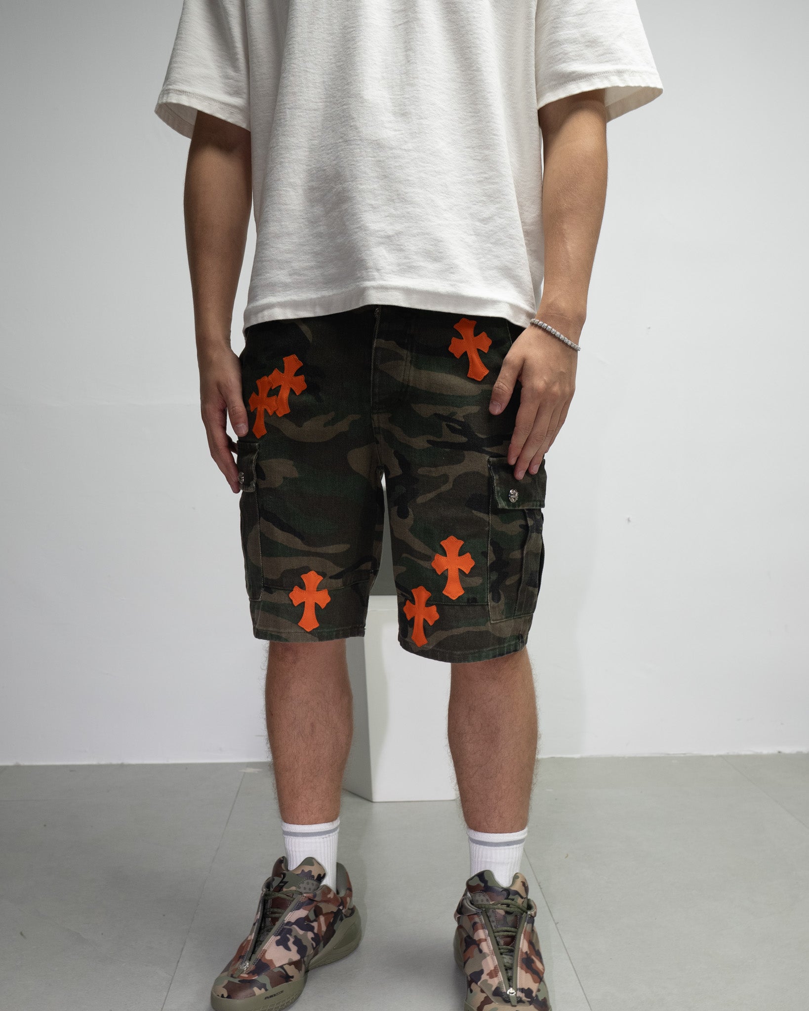 Orange Cross Patch Camo Shorts™