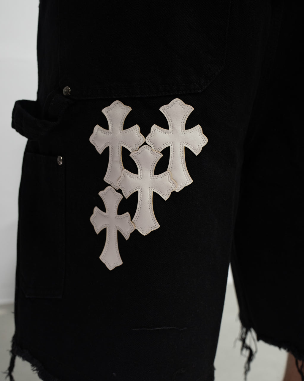 White Cross Patch Black Jean Shorts™