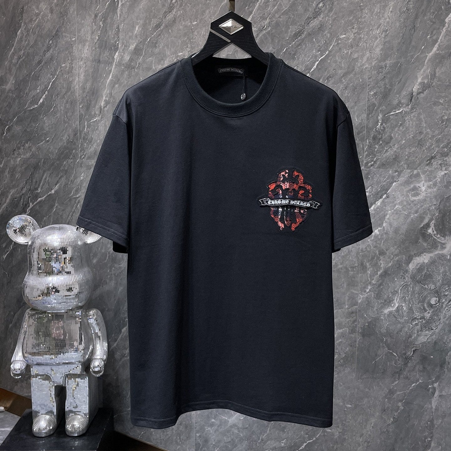 Checkered Dagger Crest Black T-Shirt™