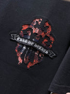 Checkered Dagger Crest Black T-Shirt™