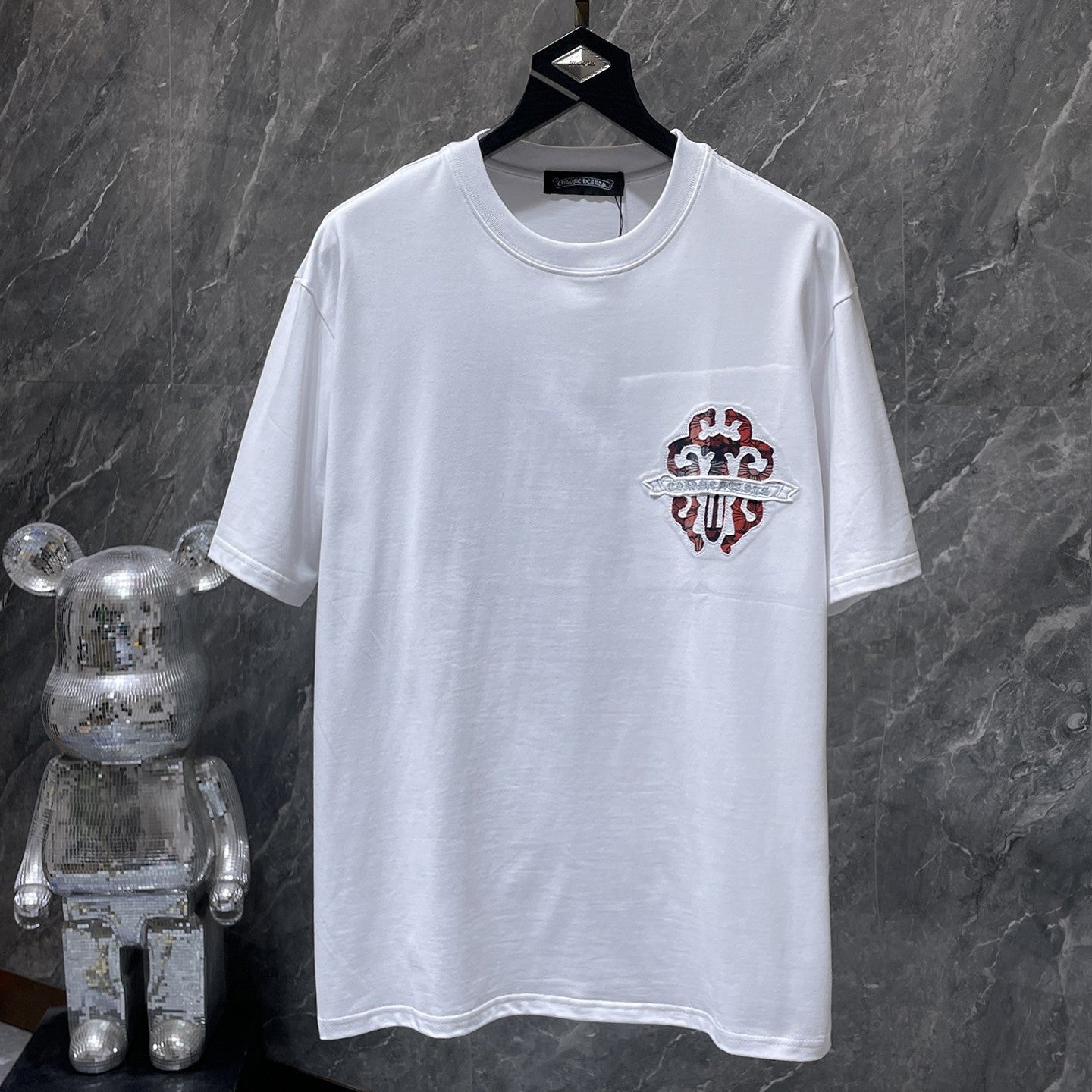 Checkered Dagger Crest White T-Shirt™