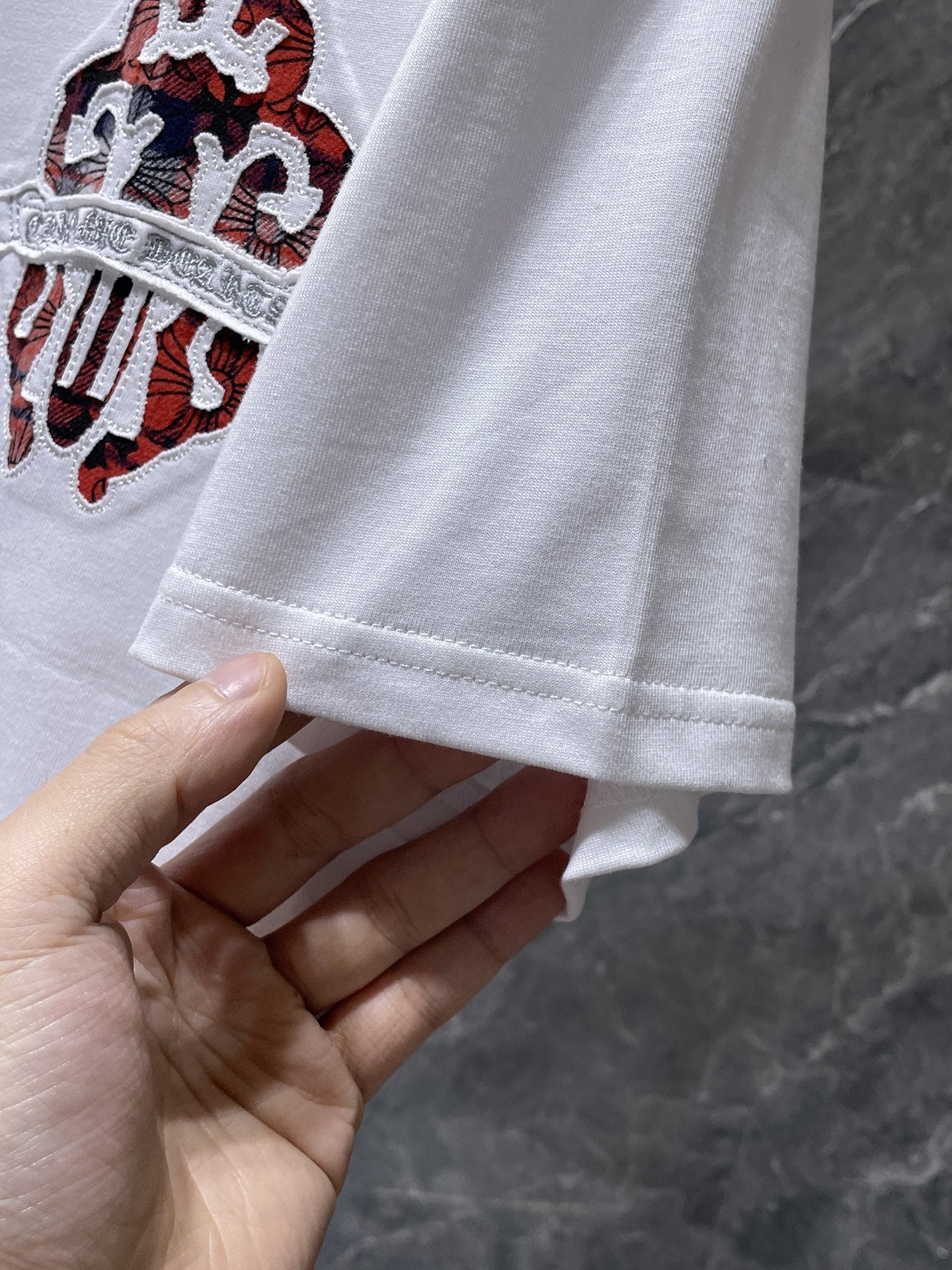Checkered Dagger Crest White T-Shirt™