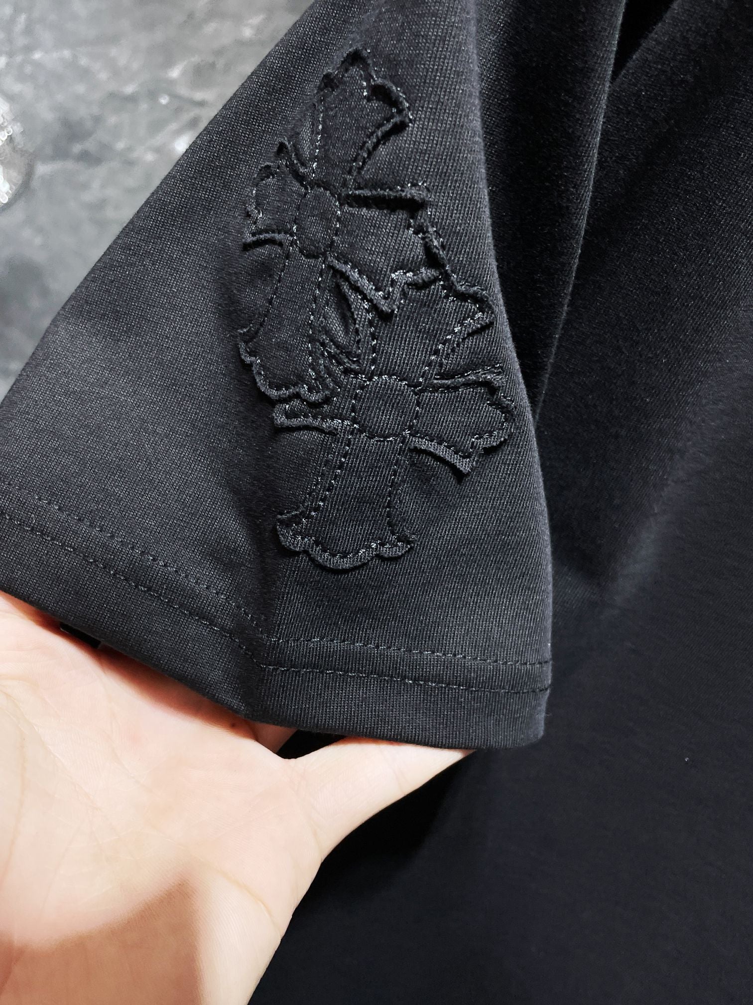 Embroidered Crosses Patch Black T-Shirt™