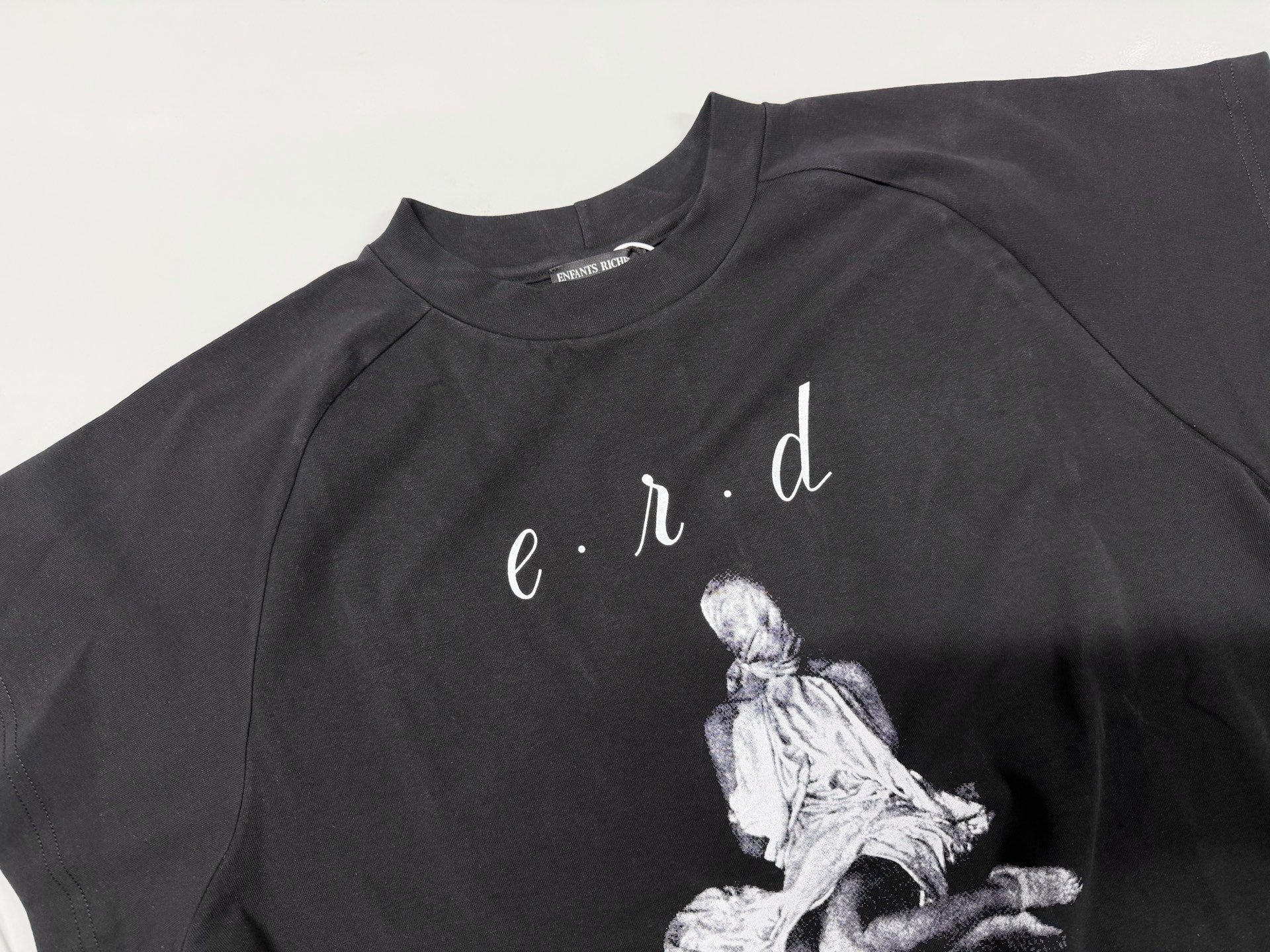 ER* Woman in Sheet Raglan Black T-Shirt™