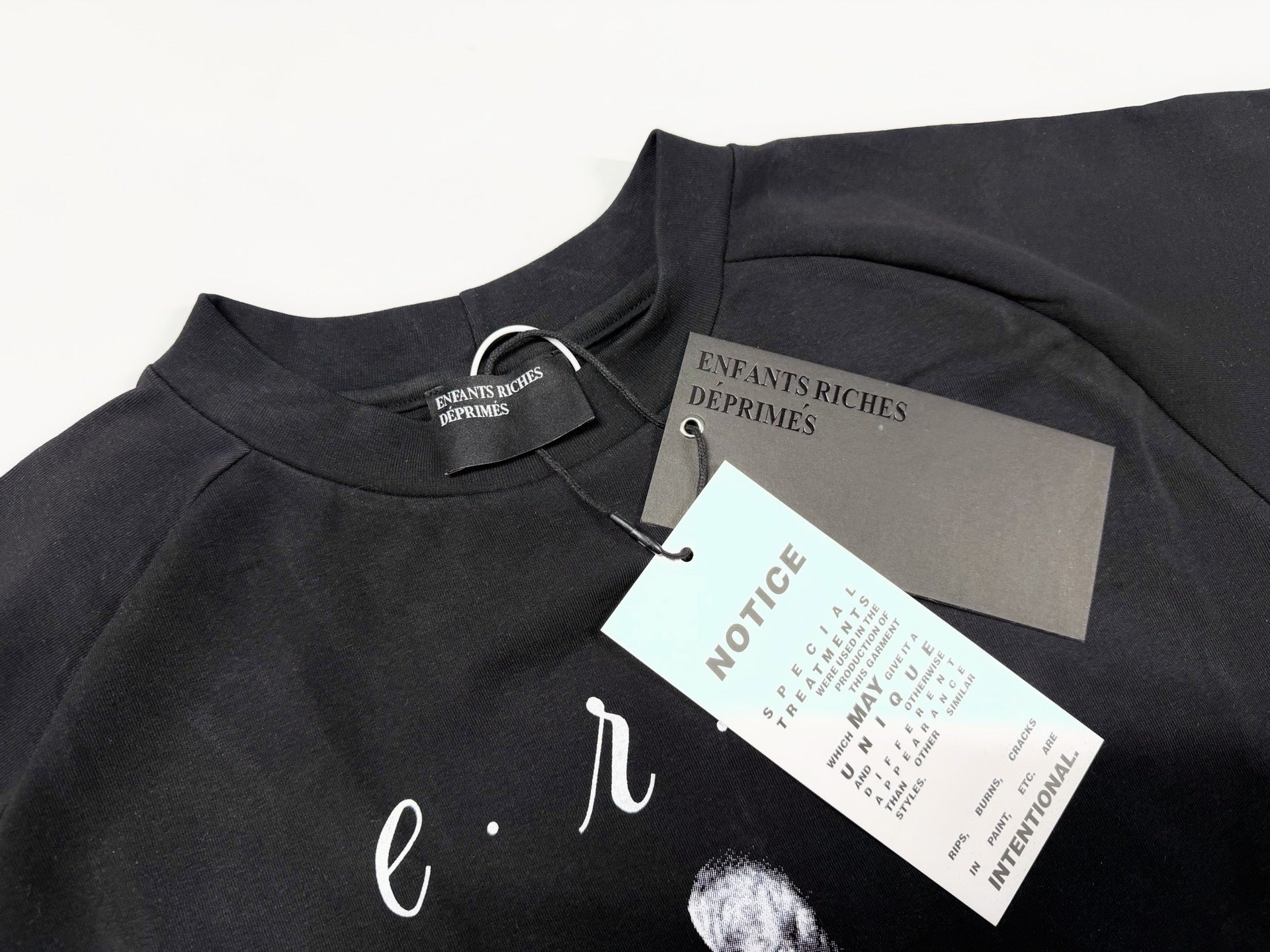 ER* Woman in Sheet Raglan Black T-Shirt™