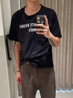 ER* Distressed Black T-Shirt™