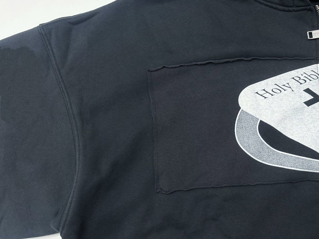 ER* Holy Bible Assemblage Black Baggy Zip Hoodie™