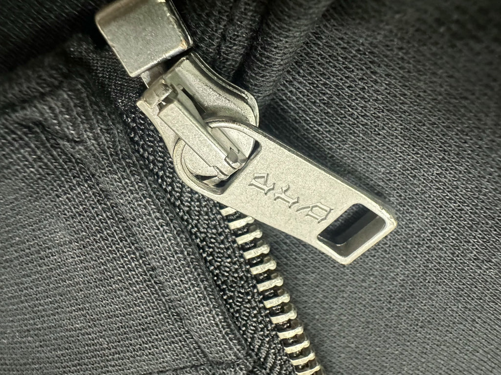 ER* Holy Bible Assemblage Black Baggy Zip Hoodie™