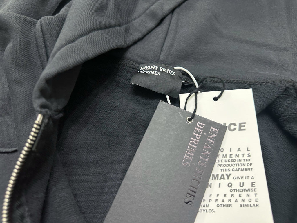 ER* Holy Bible Assemblage Black Baggy Zip Hoodie™