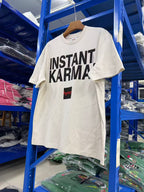 SNT Mxxxxxx Instant Karma White T-Shirt™