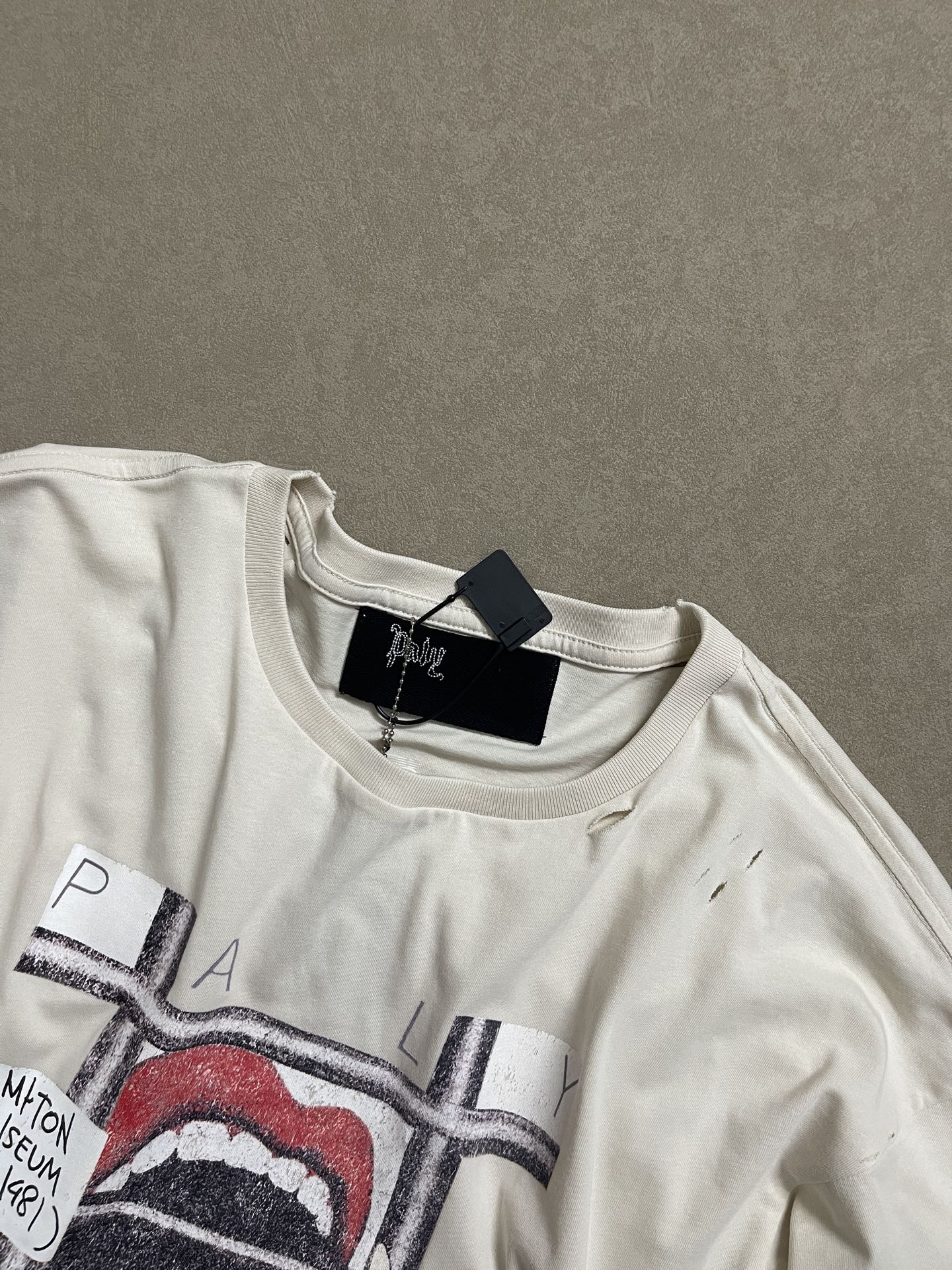 Paly Hllywd Stones Mosquito Tongue Tee™