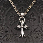 Metallic Cross Pendant Necklace™