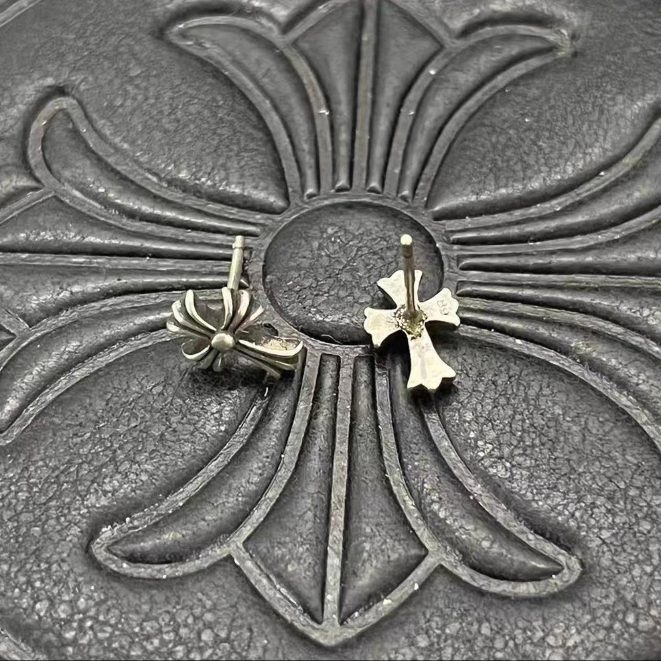 Cross Stud Earrings™