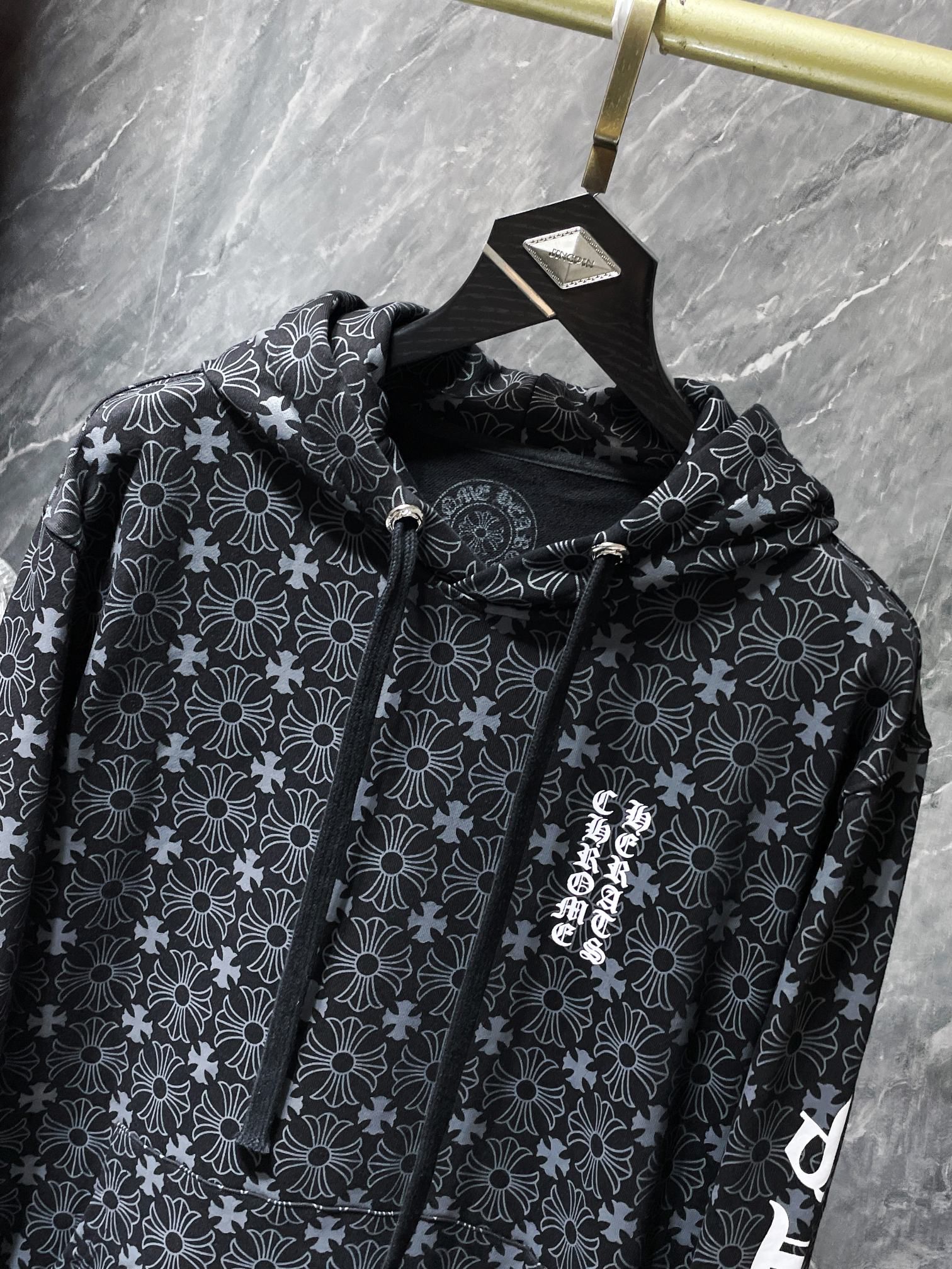 Horse Shoe Logo Black Cross Pattern Hoodie™