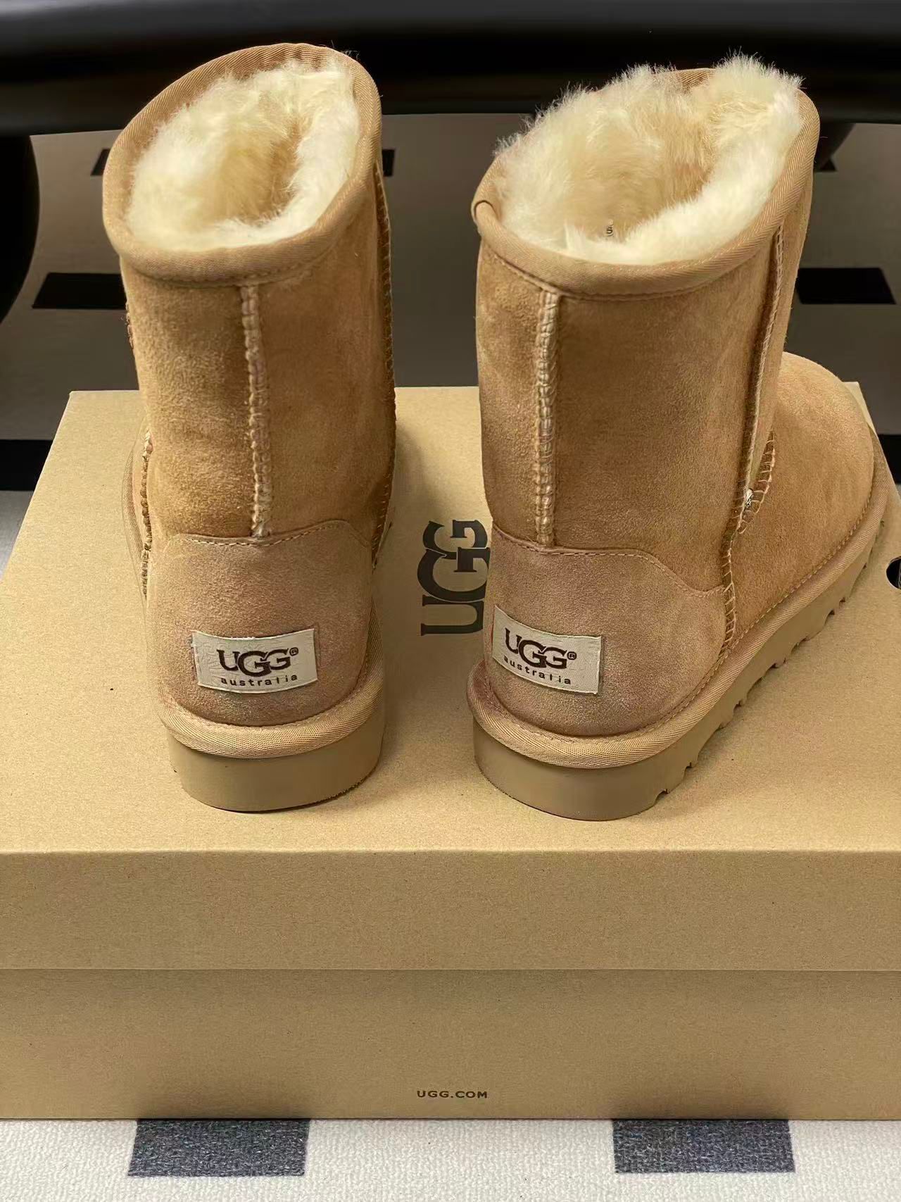 Metallic Cross Beige Fur Boots™