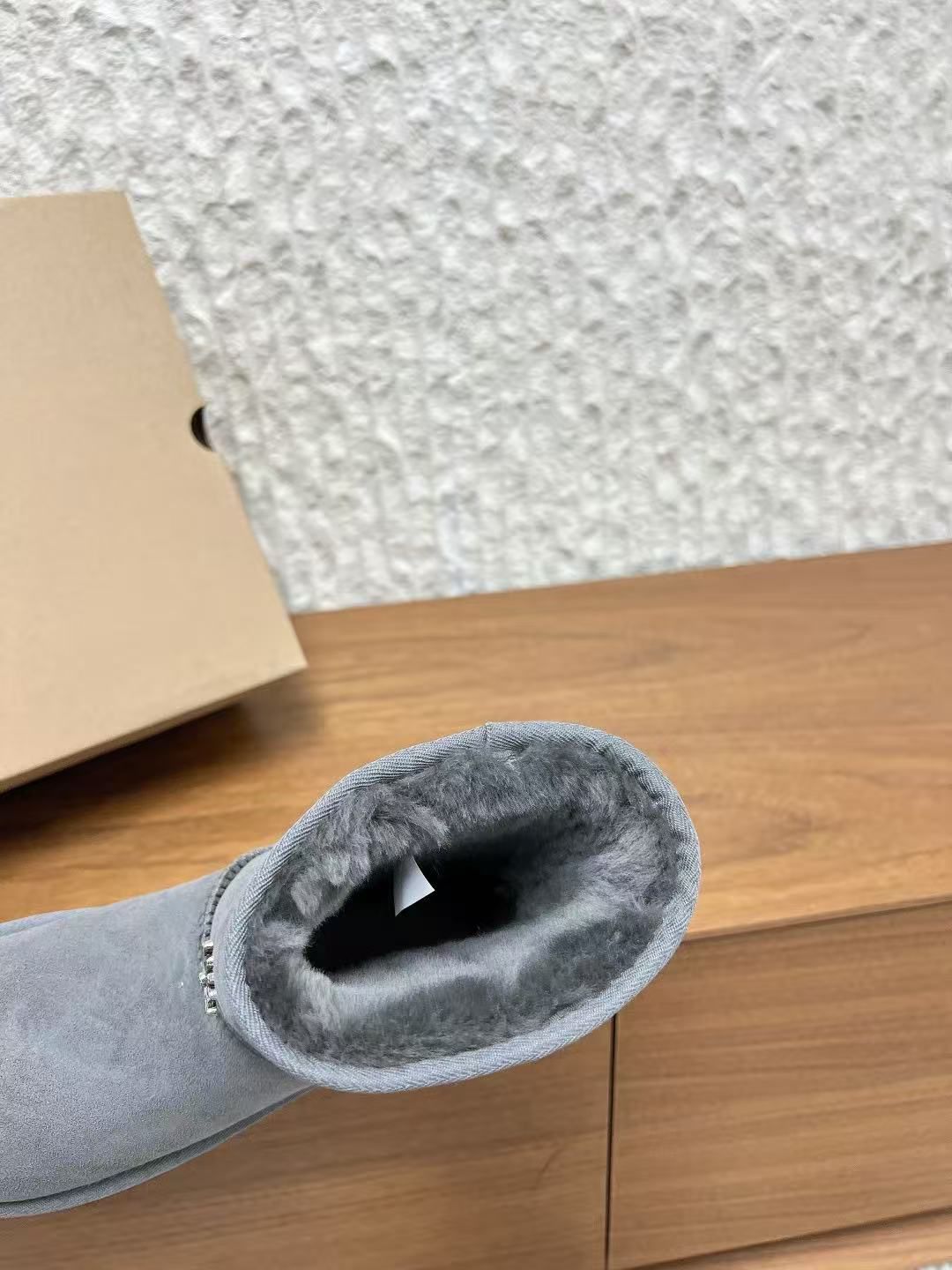 Metallic Cross Grey Fur Boots™