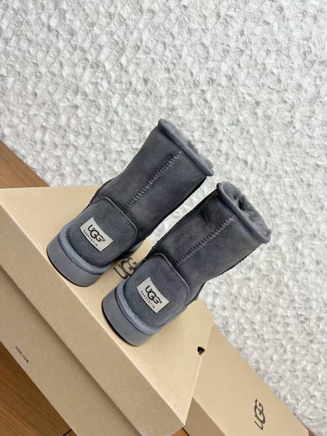 Metallic Cross Grey Fur Boots™