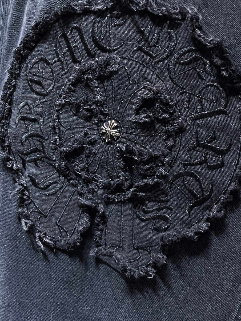 Torn Fabric Horse Shoe Logo Faded Black Denim Jacket™