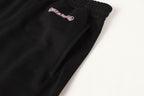 Pink Crosses Deadly Doll Black Sweatpants™