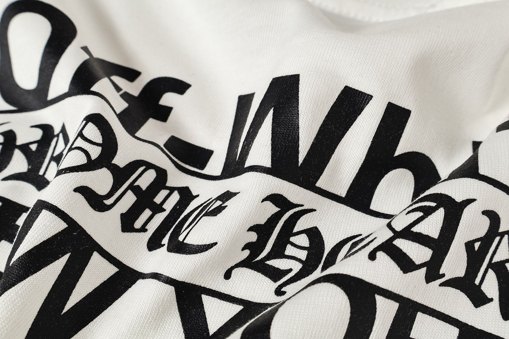 Black Leather Cross Brand Collab White T-Shirt™