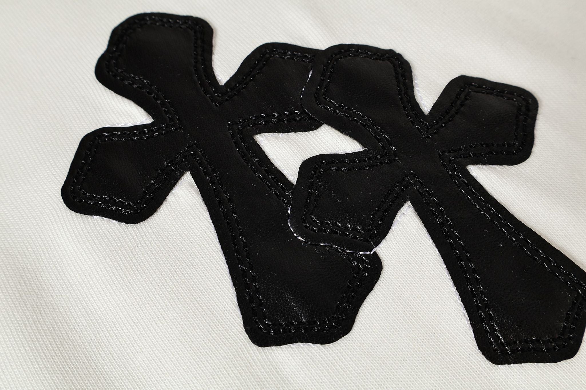 Black Leather Cross Brand Collab White T-Shirt™