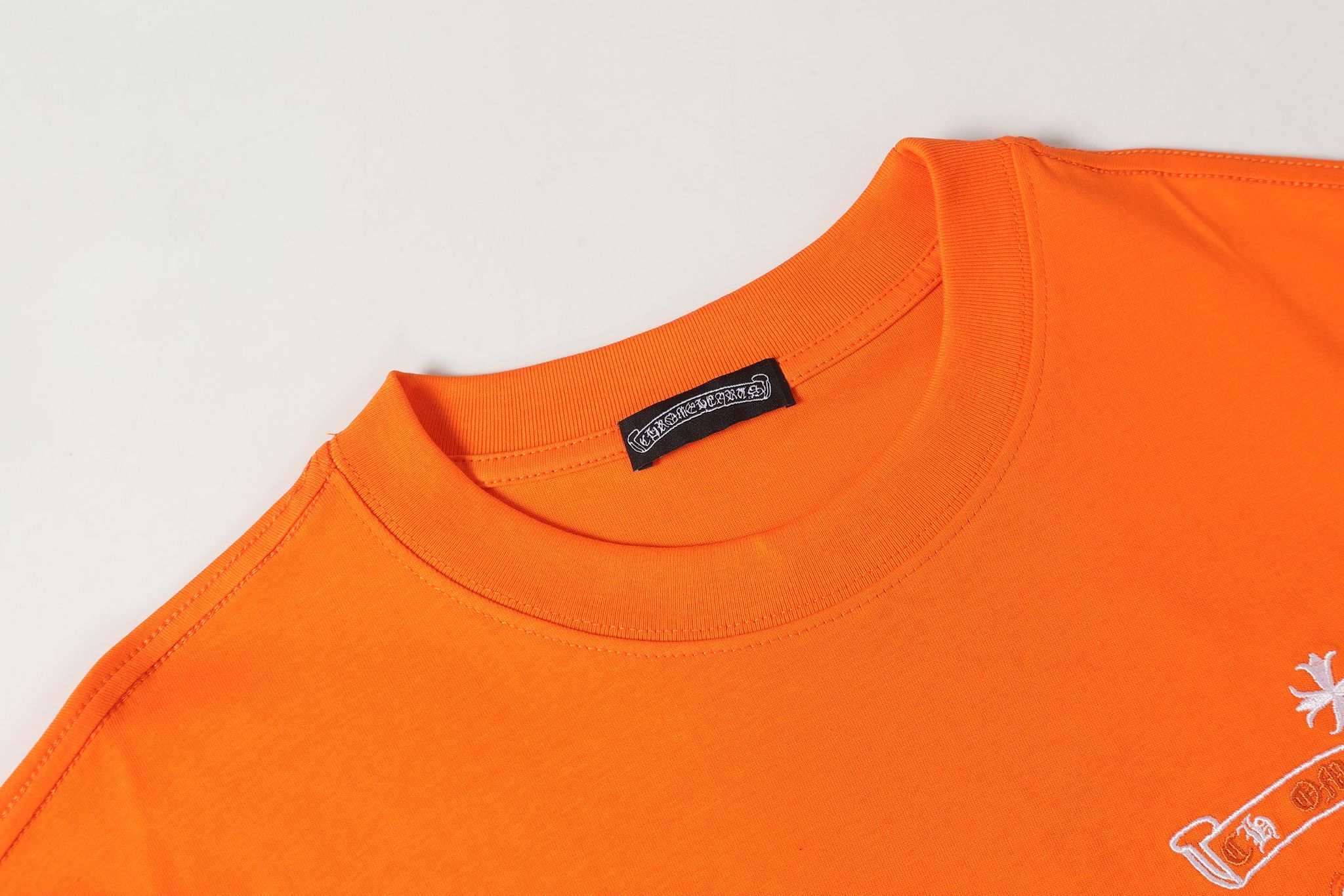 Colored Letters Horse Shoe Logo Orange T-Shirt™