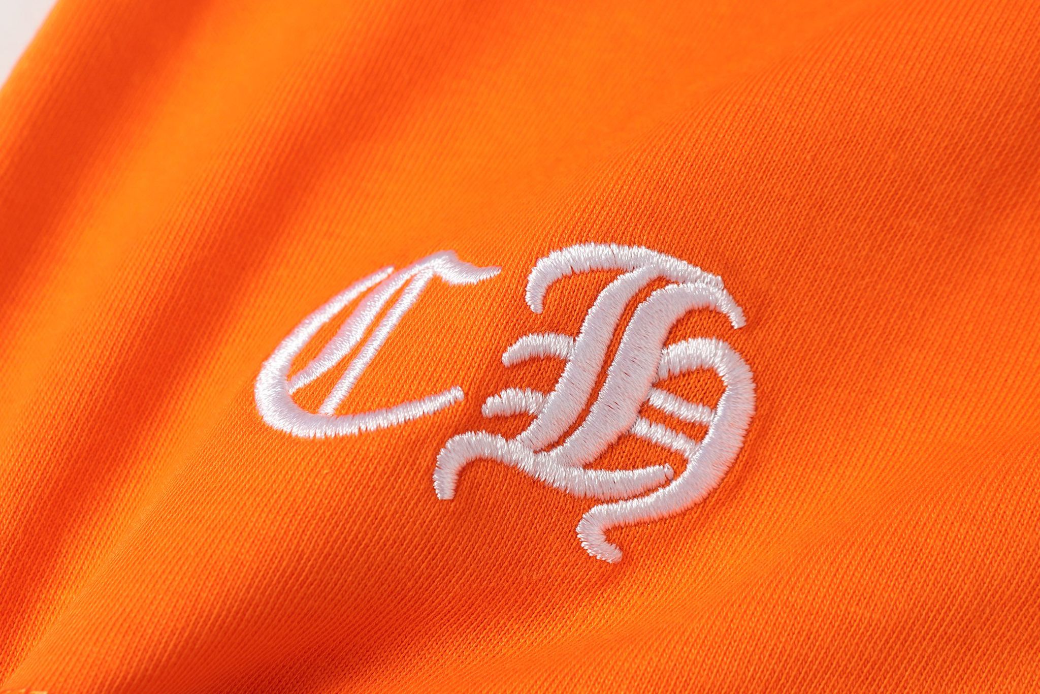 Colored Letters Horse Shoe Logo Orange T-Shirt™