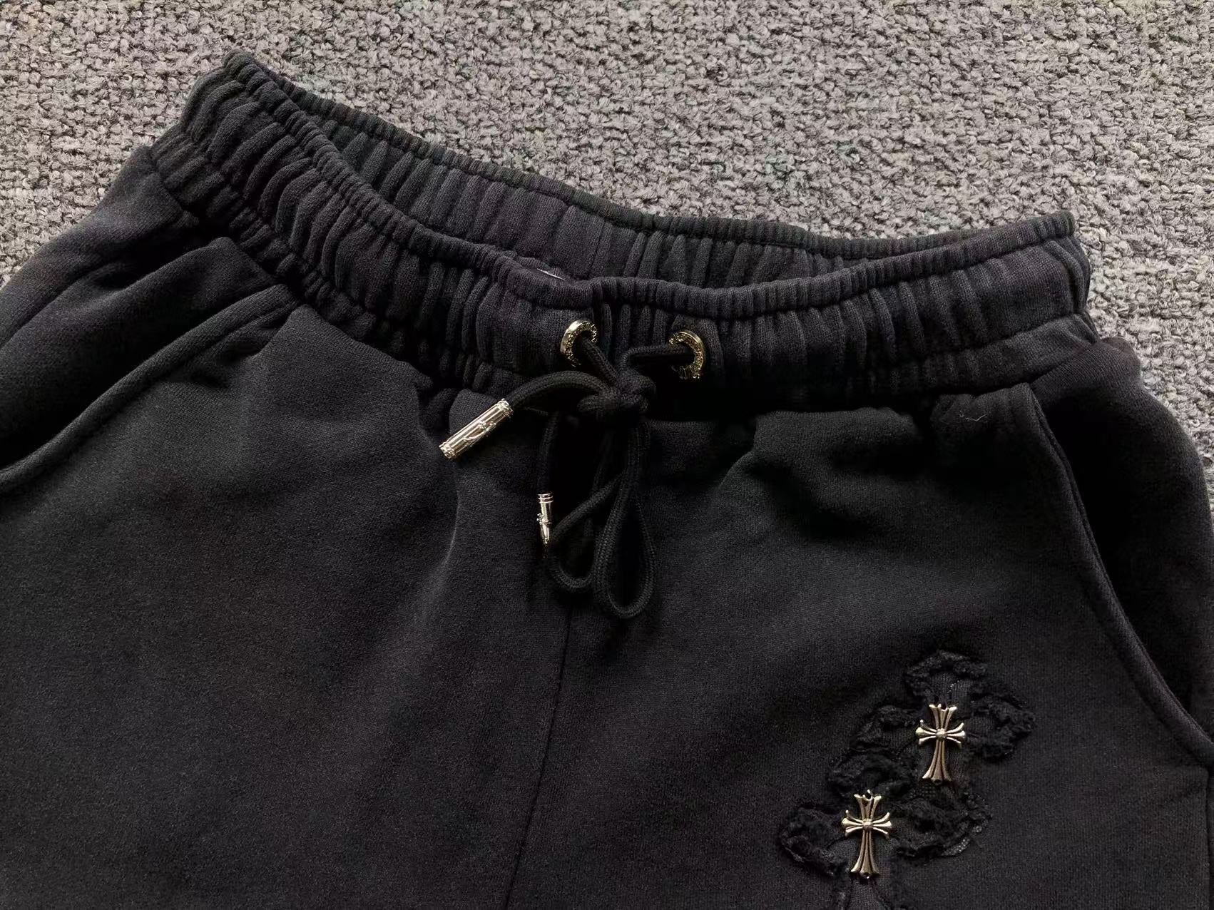 Torn Fabric Metallic Crosses Black Sweatshorts™