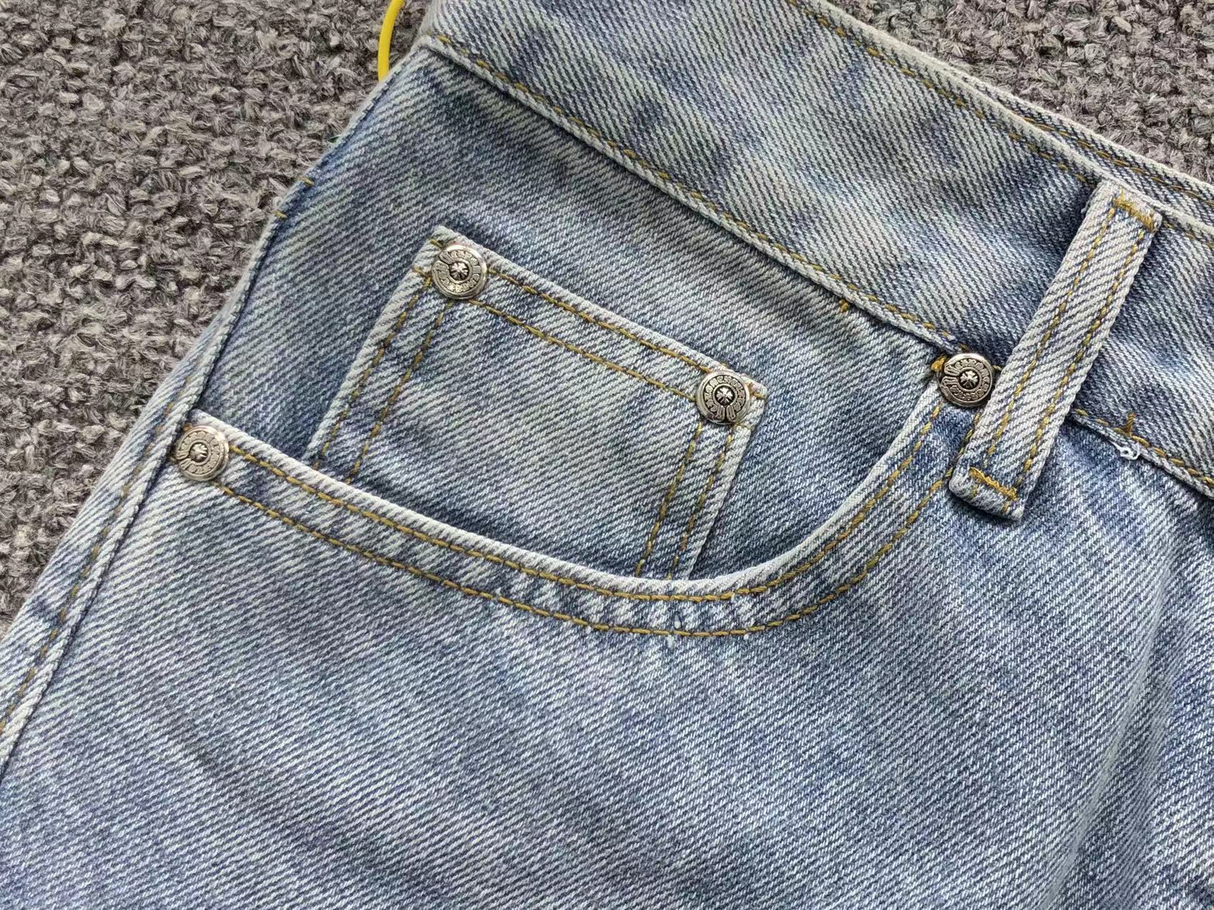 Mixed Blue & White Cross Patch Light Denim Jeans™