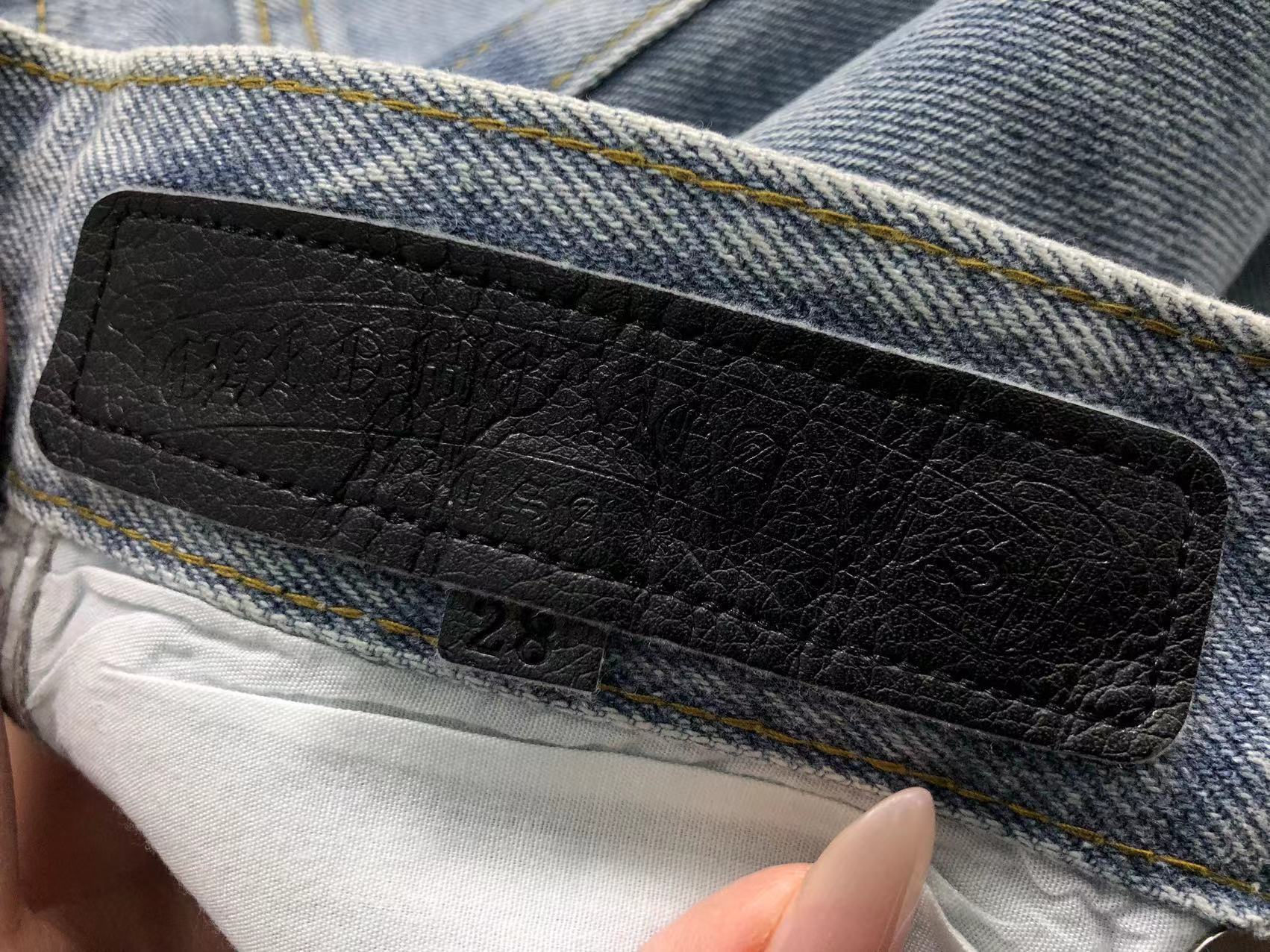 Mixed Blue & White Cross Patch Light Denim Jeans™