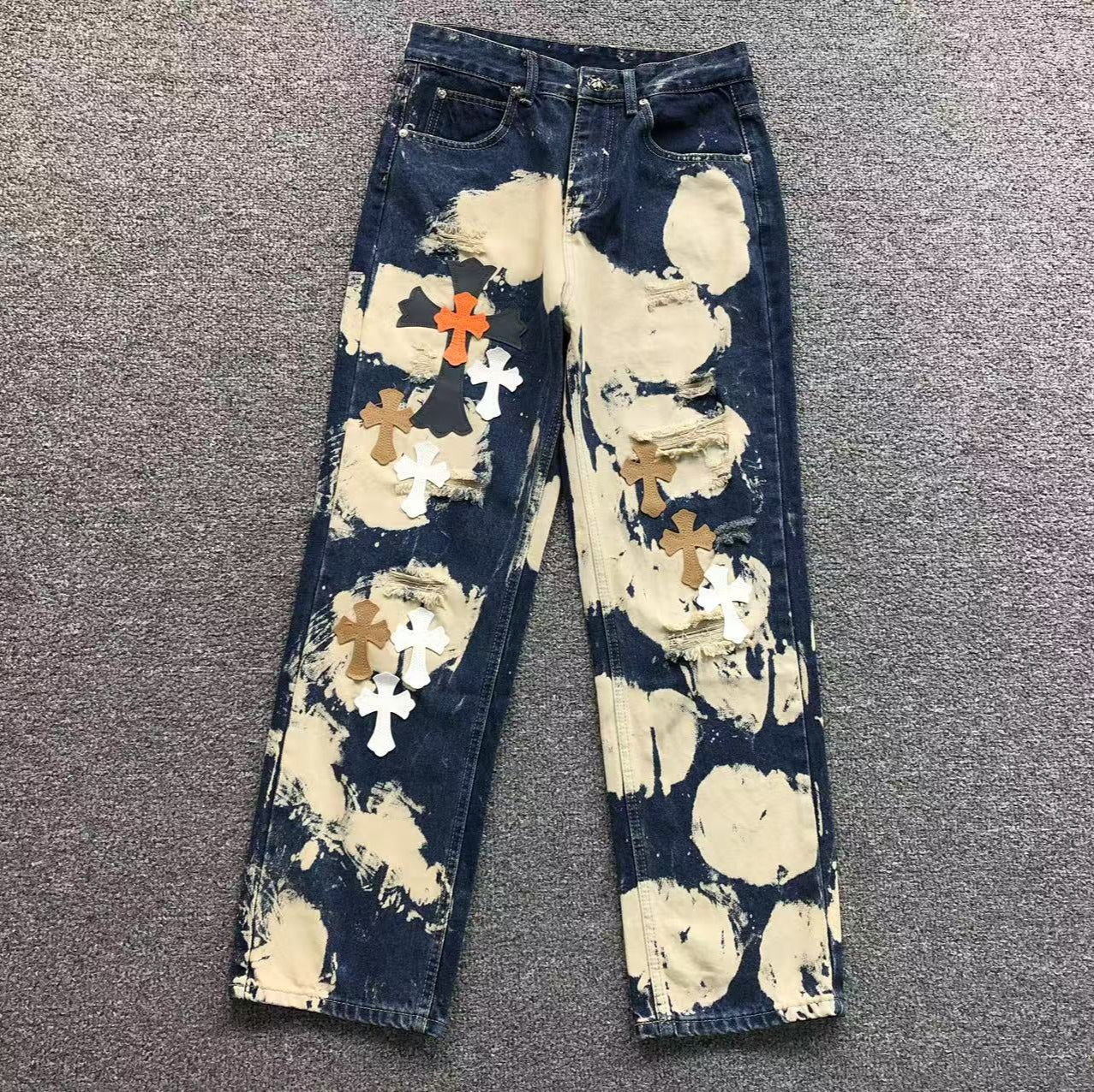 White Brown & Orange Cross Patch White Paint Marks Dark Blue Denim Jeans™