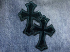 Black Cross Patch Distressed Denim Jeans™