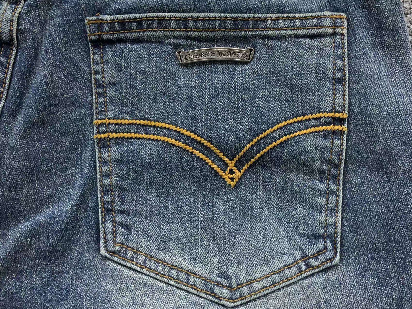 Washed Frayed Cross Patch Jeans™