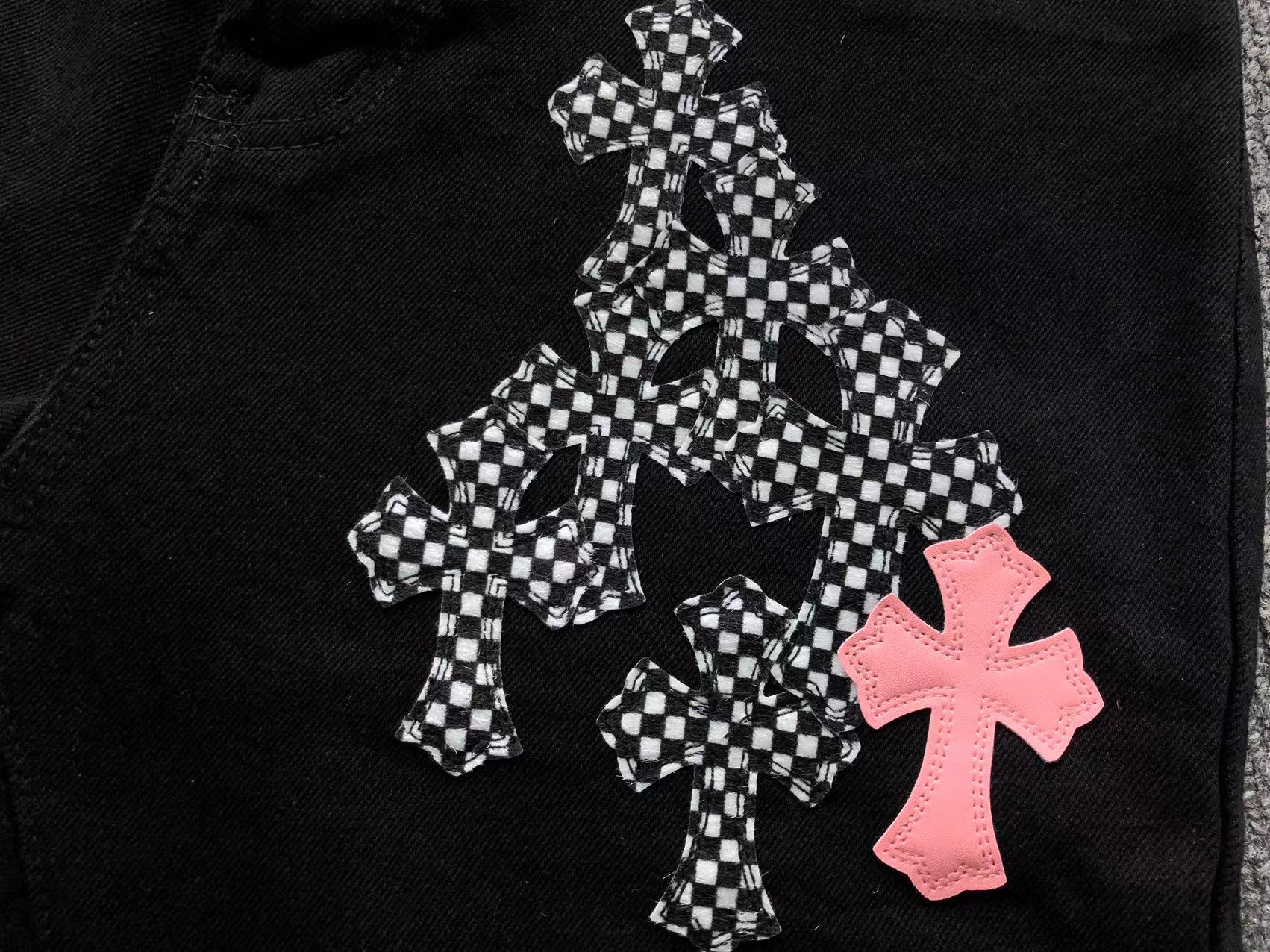 Checkered & Pink Cross Patch Black Jeans™