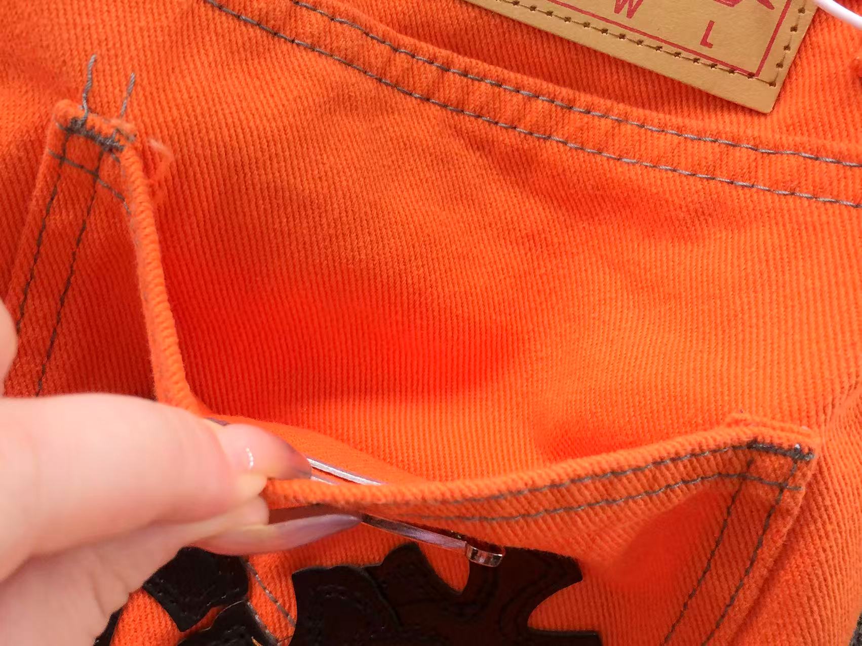 Black Cross Patch Orange Denim Jeans™
