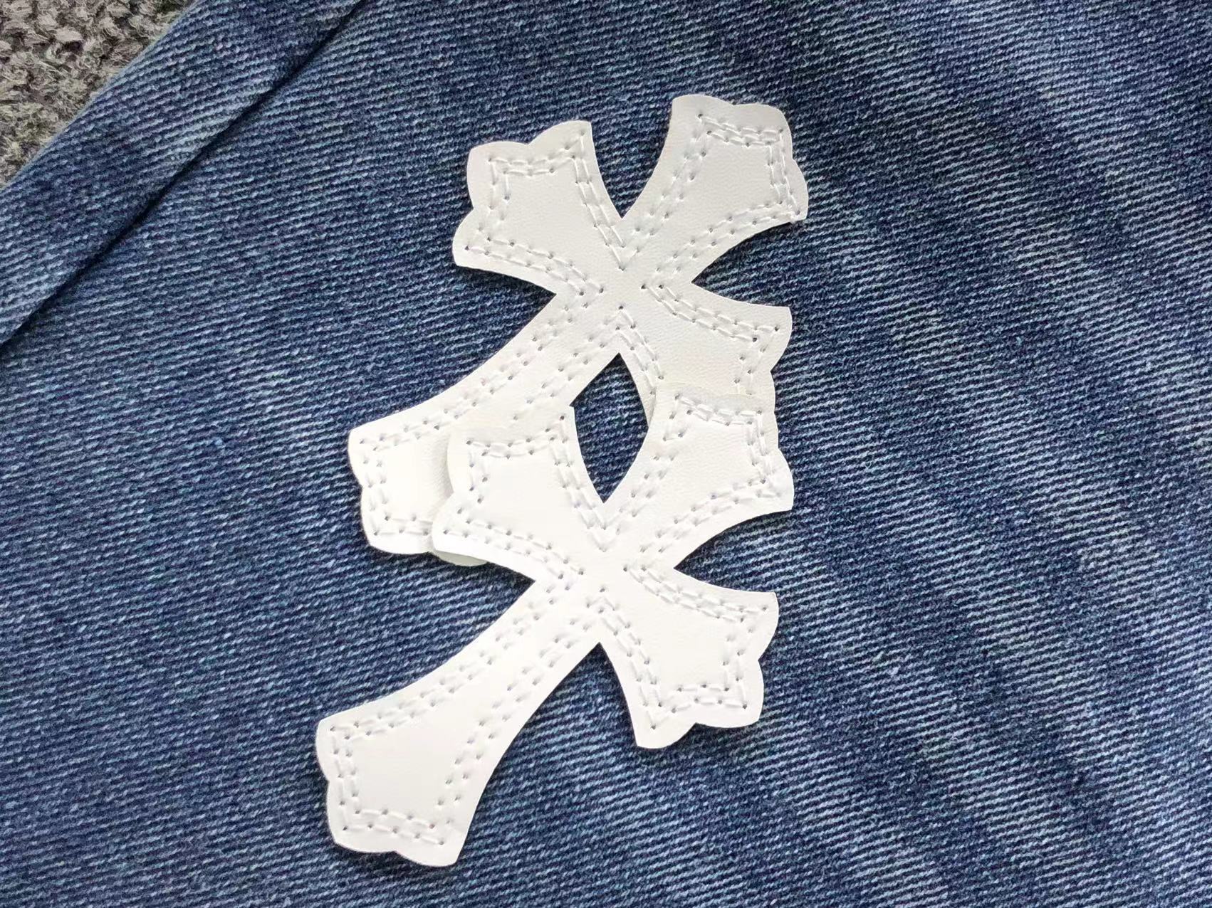 White Cross Patch Distressed Denim Jeans™