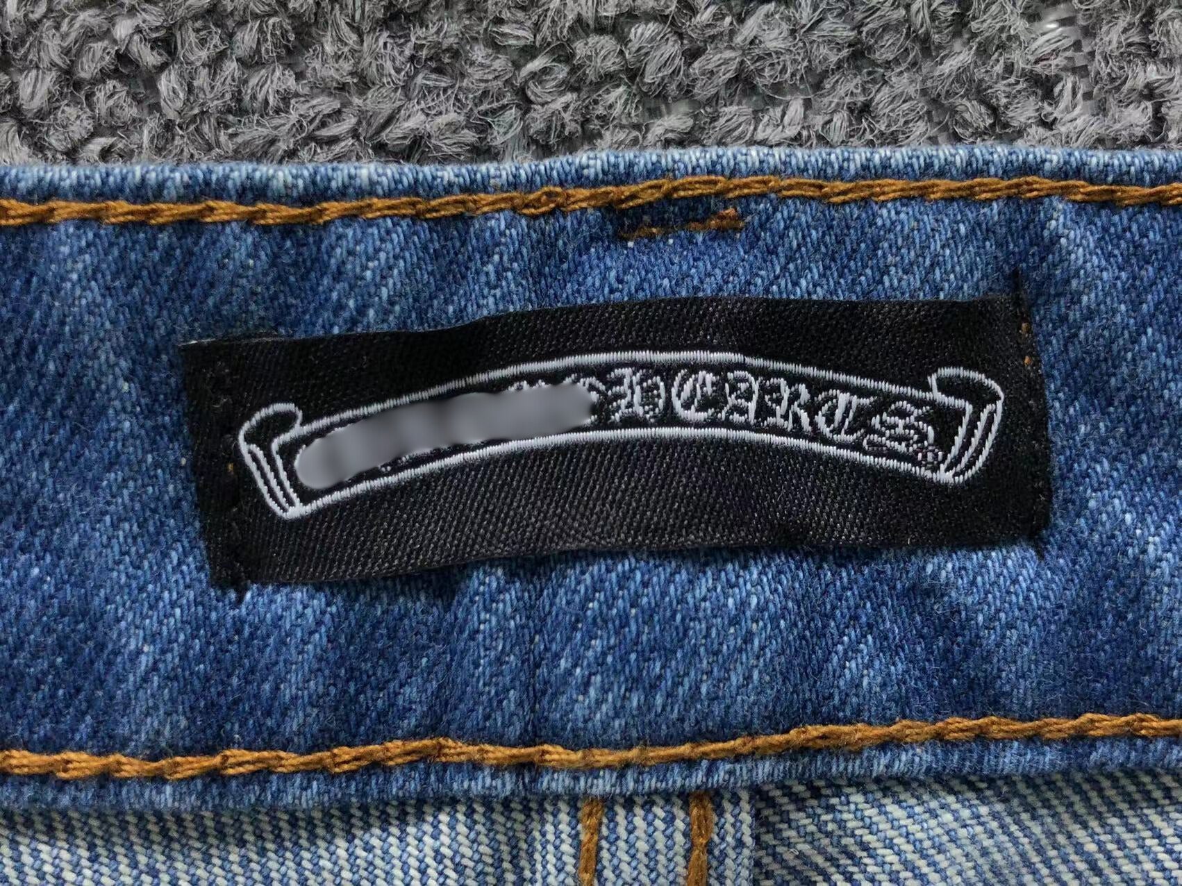 Stacked Black Crosses Denim Jeans™