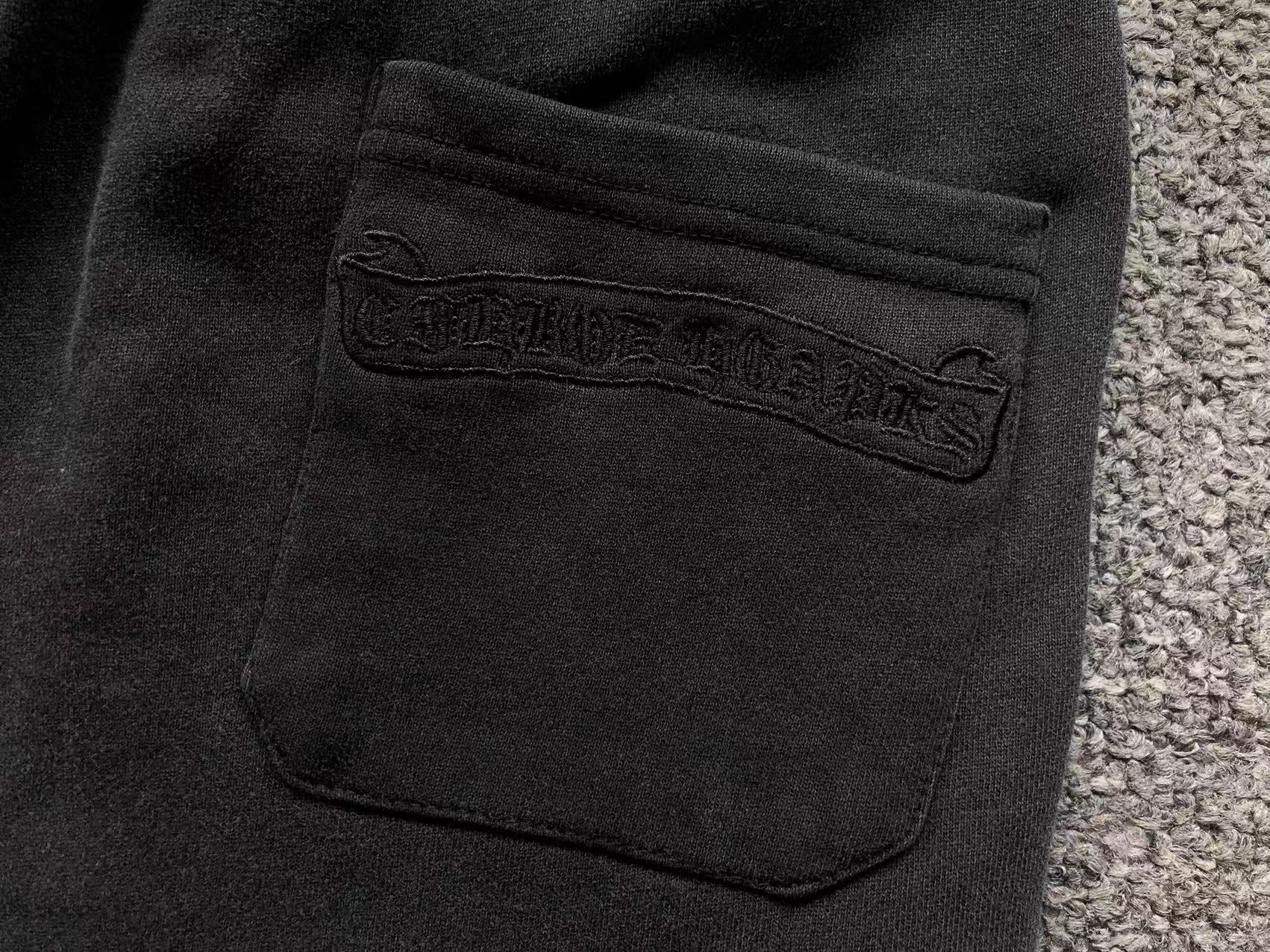 Torn Fabric Metallic Crosses Black Sweatshorts™