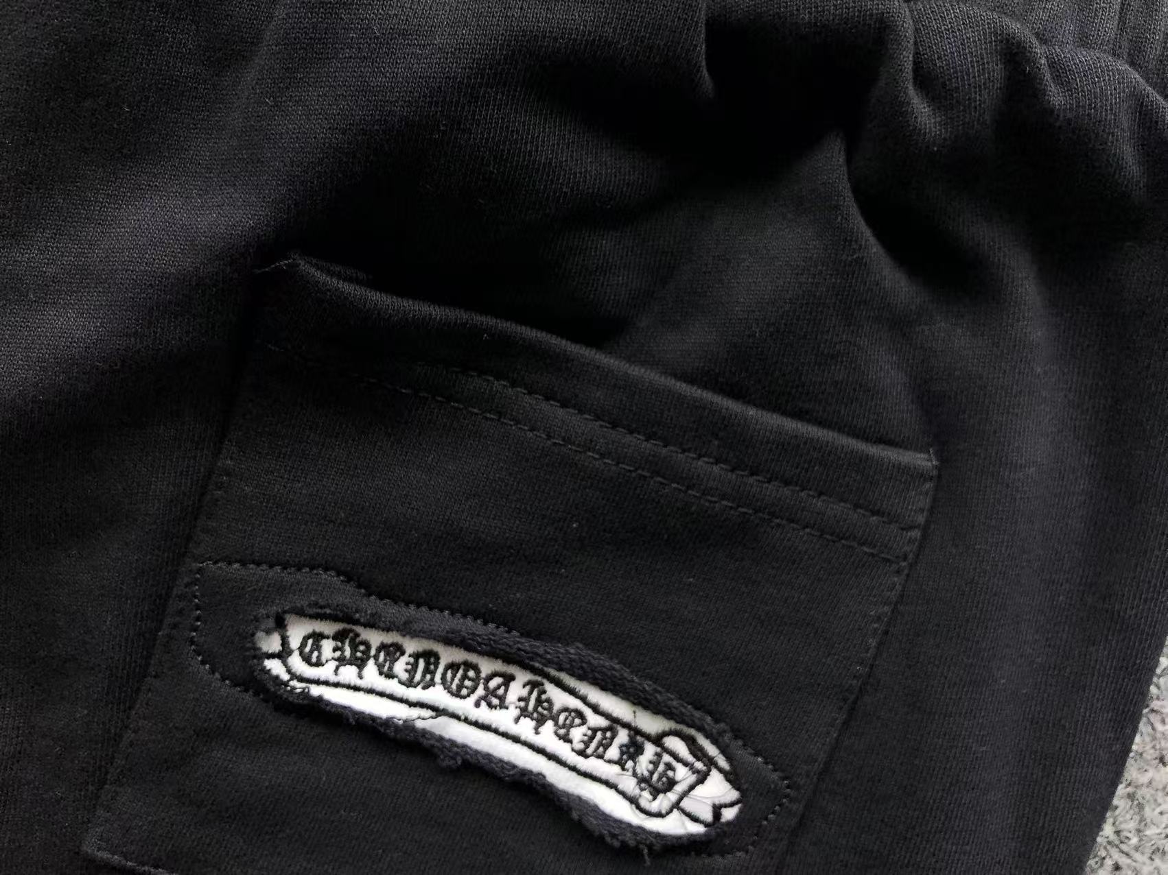 Torn Fabric Cross Black Sweatshorts™