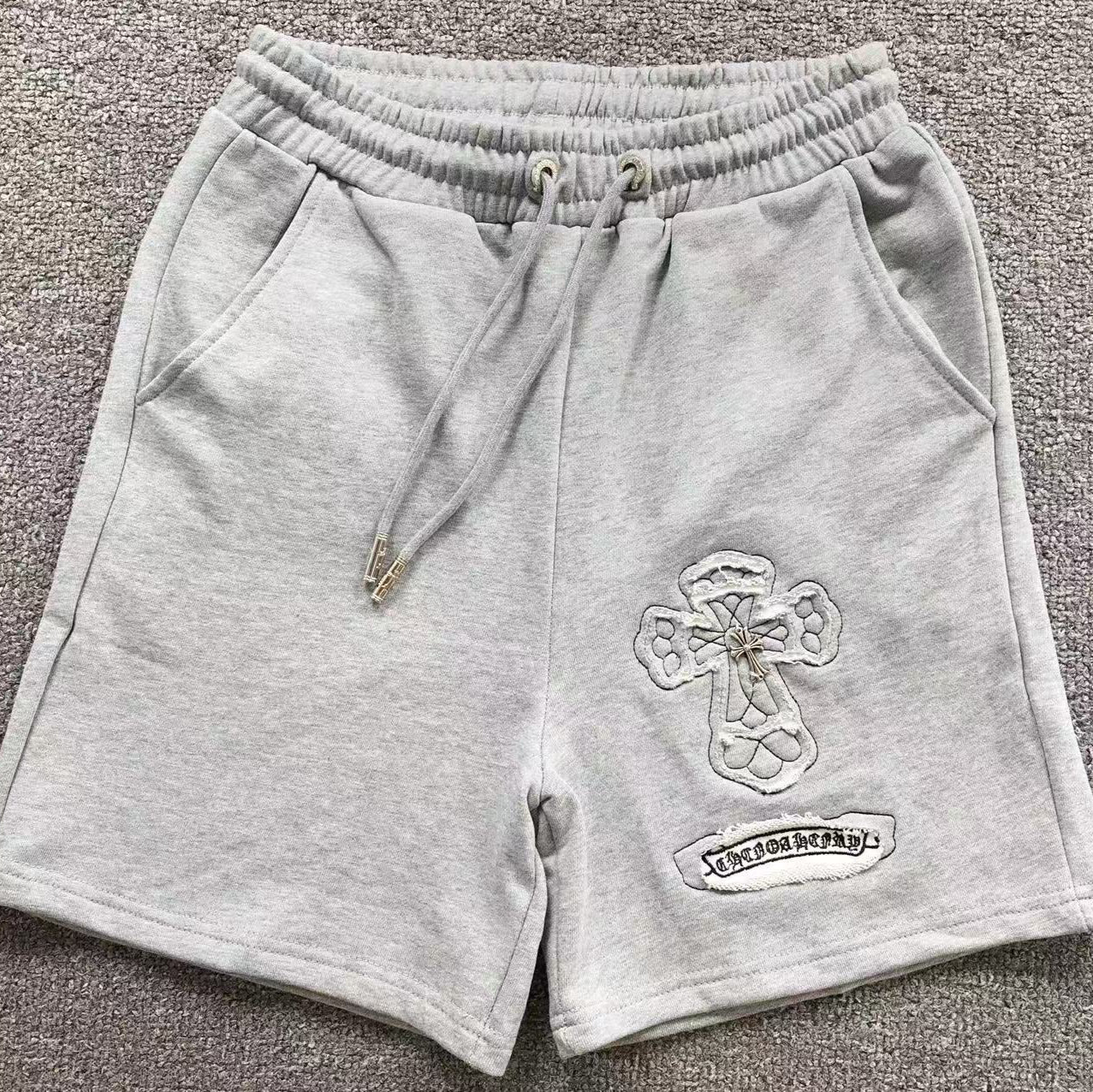 Torn Fabric Cross Grey Sweatshorts™