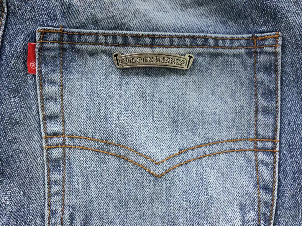 Black Cross Patch Distressed Denim Jeans™