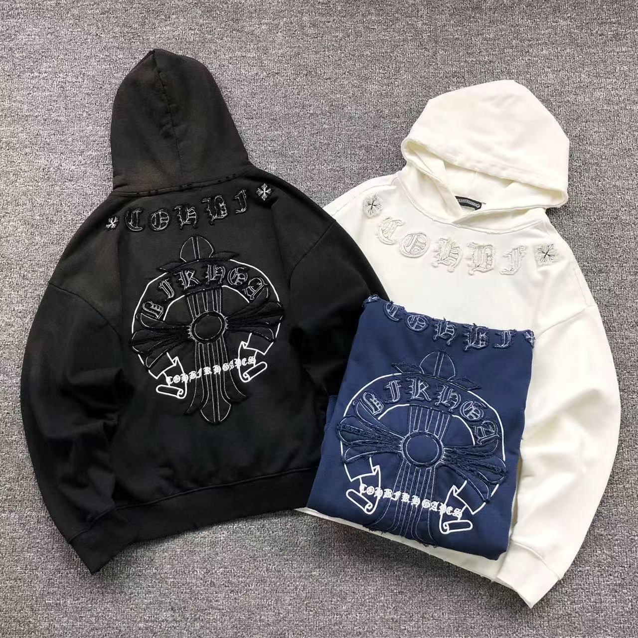 Faded Embroidered Cross Hoodie™