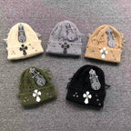 Leather & Metallic Cross Torn Knit Beanie™